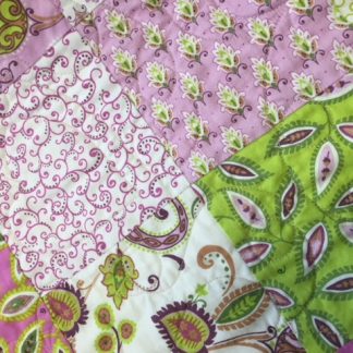 purple and green quilt